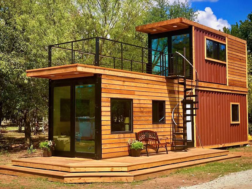 Storey stacked shipping container home with a roof terrace